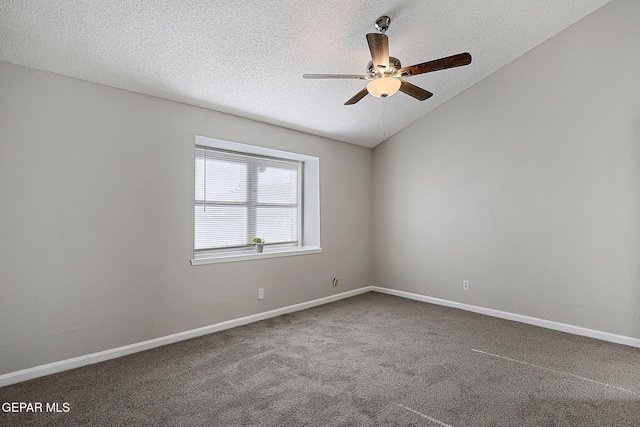 819 Los Surcos Rd, El Paso, TX 79907 - unfurnished room with ceiling fan, a textured ceiling, carpet, lofted ceiling, and baseboards