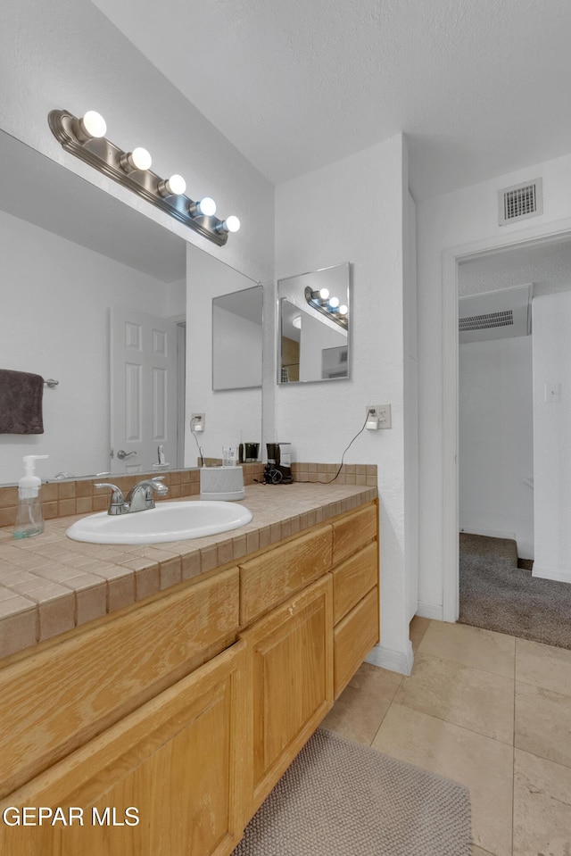 4433 Stanton St Unit T37, El Paso, TX 79902 - bathroom featuring tile patterned floors and vanity