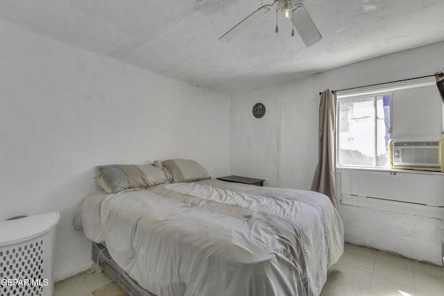 720 Johnson St, Fabens, TX 79838 - tiled bedroom with cooling unit and a ceiling fan