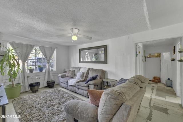 720 Johnson St, Fabens, TX 79838 - living area with a ceiling fan and a textured ceiling