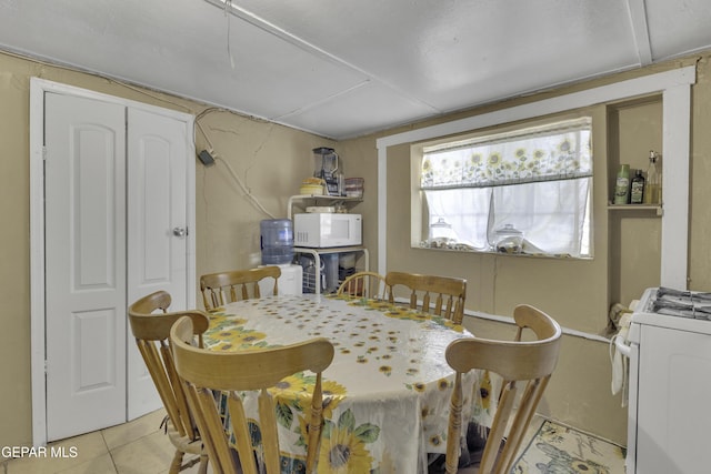 720 Johnson St, Fabens, TX 79838 - dining space with tile patterned floors