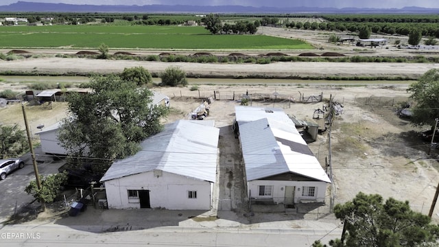 720 Johnson St, Fabens, TX 79838 - aerial view of sparsely populated area featuring a mountain backdrop