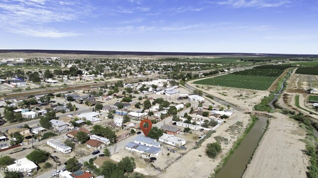 720 Johnson St, Fabens, TX 79838 - aerial view of property and surrounding area with farmland and rural landscape