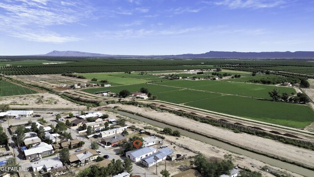 720 Johnson St, Fabens, TX 79838 - aerial view of sparsely populated area with rows of crops and a mountainous background