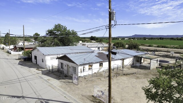 720 Johnson St, Fabens, TX 79838 - exterior space with fence and a mountain view