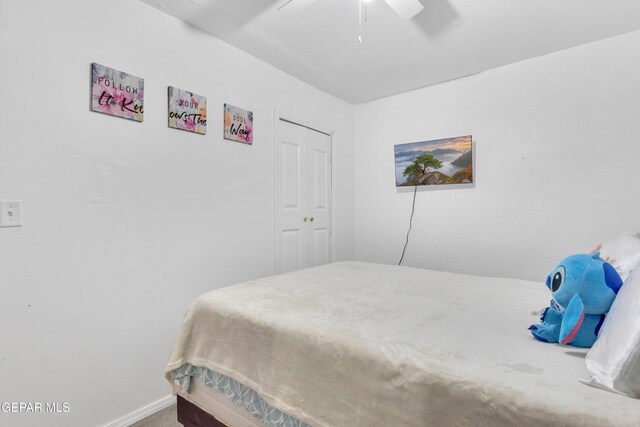 720 Johnson St, Fabens, TX 79838 - bedroom with carpet flooring, a ceiling fan, and baseboards