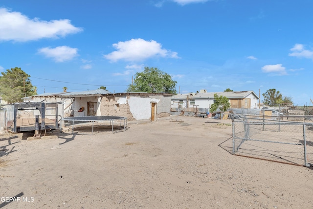 720 Johnson St, Fabens, TX 79838 - view of yard featuring fence and a trampoline