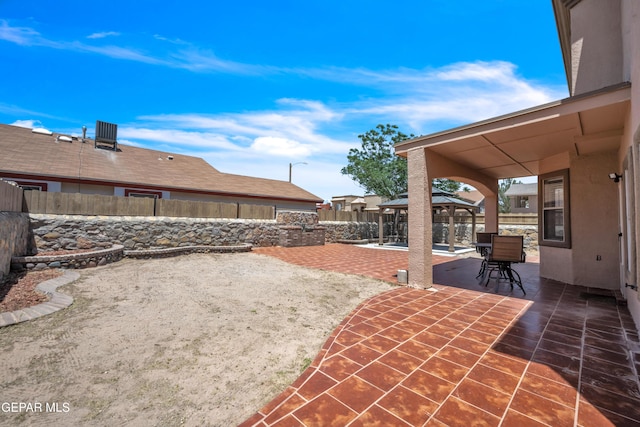 3081 Tierra Humeda Dr, El Paso, TX 79938 - fenced backyard with a gazebo and a patio area