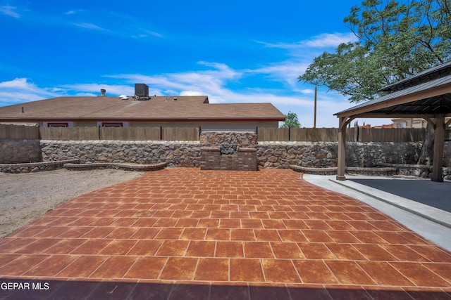 3081 Tierra Humeda Dr, El Paso, TX 79938 - fenced backyard featuring a gazebo and a patio