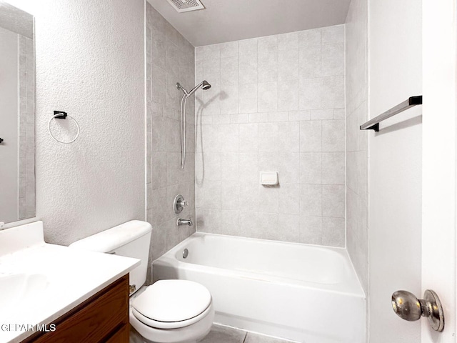 3081 Tierra Humeda Dr, El Paso, TX 79938 - bathroom featuring vanity, bathing tub / shower combination, toilet, and a textured wall