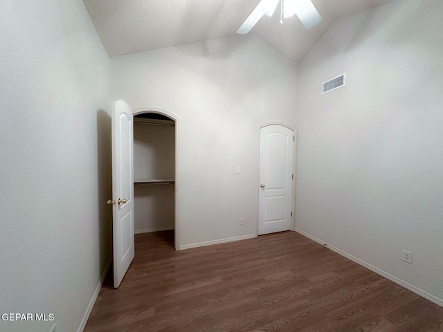 3081 Tierra Humeda Dr, El Paso, TX 79938 - empty room featuring ceiling fan, wood finished floors, baseboards, and high vaulted ceiling