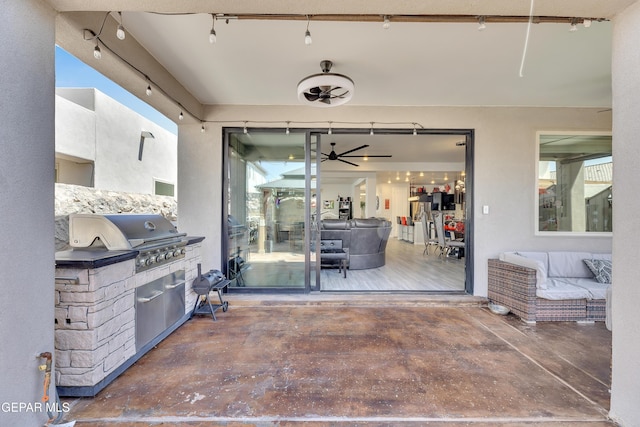 view of patio / terrace with exterior kitchen and grilling area