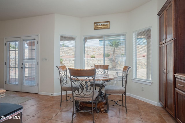 7350 Rosas Way, Canutillo, TX 79835 - dining space with light tile patterned floors, healthy amount of natural light, and french doors