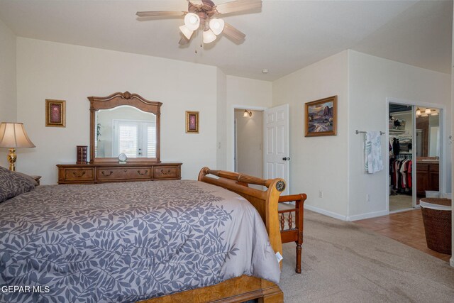 7350 Rosas Way, Canutillo, TX 79835 - bedroom featuring carpet, a walk in closet, ceiling fan, a closet, and baseboards
