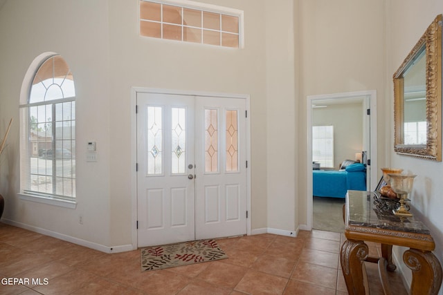 7350 Rosas Way, Canutillo, TX 79835 - tiled entrance foyer featuring a towering ceiling and baseboards