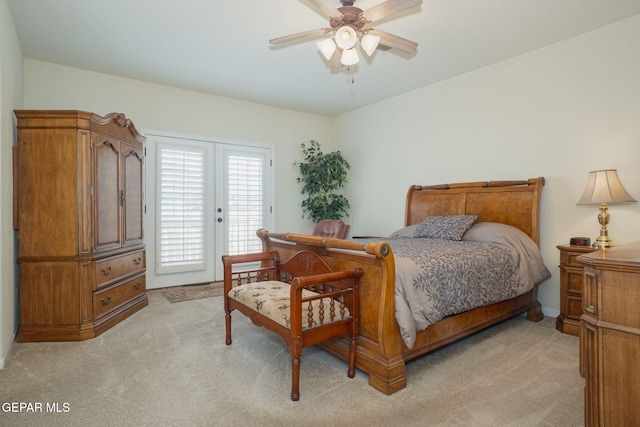 7350 Rosas Way, Canutillo, TX 79835 - bedroom with light colored carpet, access to exterior, and a ceiling fan