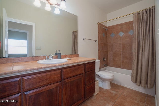 7350 Rosas Way, Canutillo, TX 79835 - bathroom featuring tile patterned flooring, toilet, vanity, and shower / tub combo