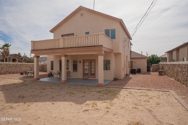 7350 Rosas Way, Canutillo, TX 79835 - rear view of house with french doors, a fenced backyard, a patio, stucco siding, and cooling unit