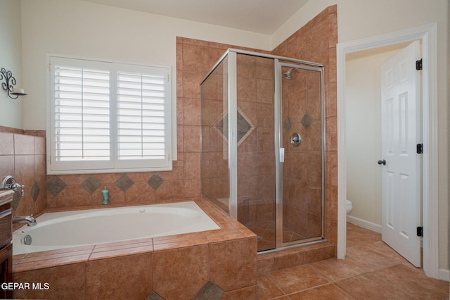 7350 Rosas Way, Canutillo, TX 79835 - bathroom with a stall shower, a garden tub, toilet, and tile patterned flooring