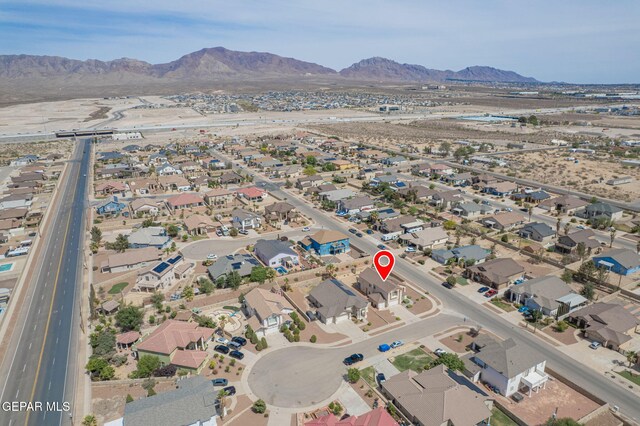7350 Rosas Way, Canutillo, TX 79835 - aerial view of property and surrounding area featuring a mountainous background and nearby suburban area