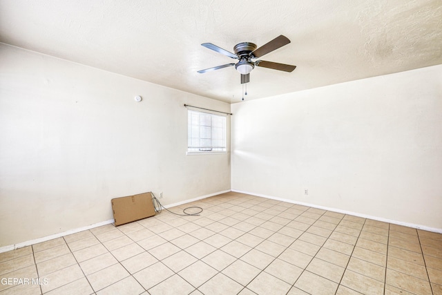 4209 Hercules Ave, El Paso, TX 79904 - empty room featuring a ceiling fan, baseboards, and light tile patterned floors