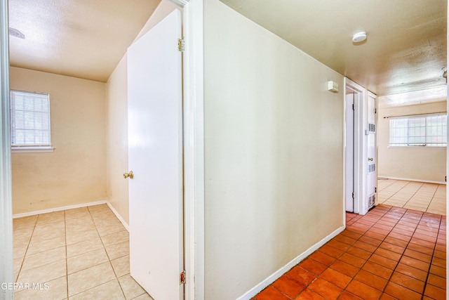 4209 Hercules Ave, El Paso, TX 79904 - corridor with tile patterned flooring and baseboards