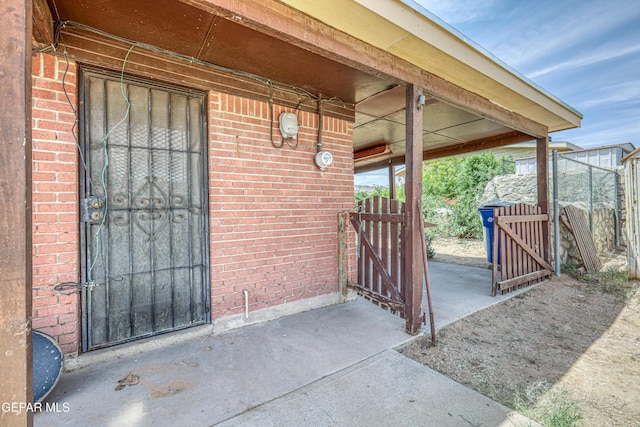 4209 Hercules Ave, El Paso, TX 79904 - doorway to property with a gate and brick siding