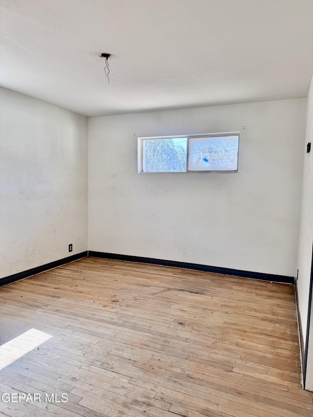 4500 Frankfort Ave, El Paso, TX 79903 - empty room with light wood-style floors and baseboards