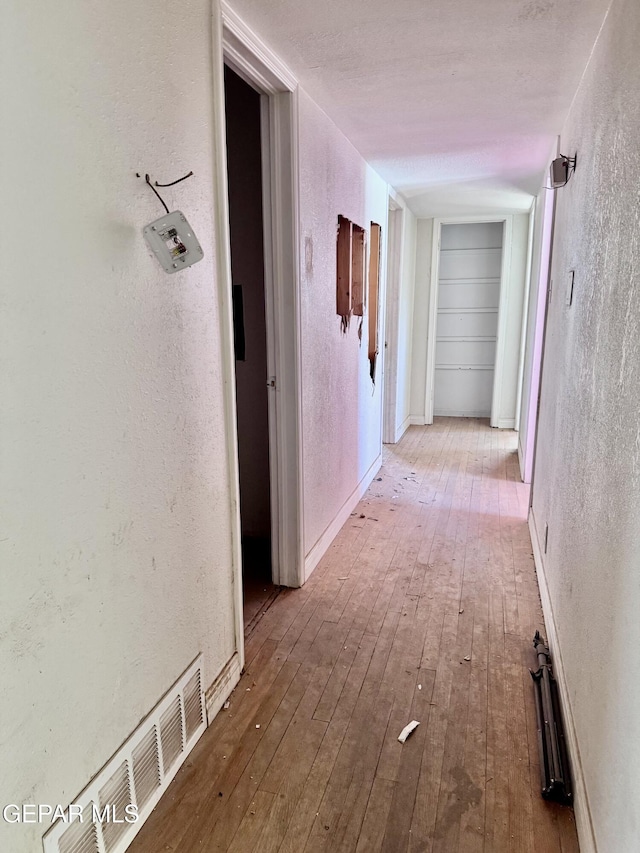 4500 Frankfort Ave, El Paso, TX 79903 - corridor featuring wood-type flooring and a textured wall