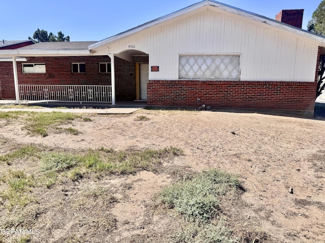 4500 Frankfort Ave, El Paso, TX 79903 - ranch-style house with a chimney and brick siding