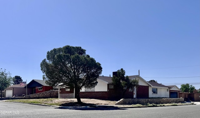 4500 Frankfort Ave, El Paso, TX 79903 - ranch-style house featuring brick siding and a garage