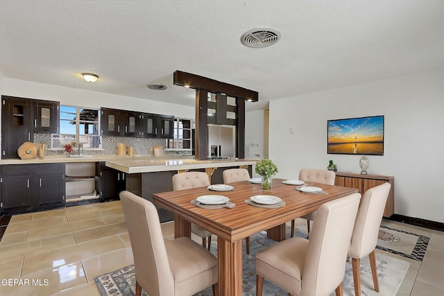 5713 Sanders Ave, El Paso, TX 79924 - dining room with light tile patterned floors
