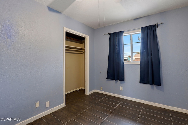 5713 Sanders Ave, El Paso, TX 79924 - unfurnished bedroom with baseboards and a closet