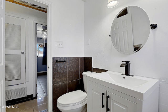 5713 Sanders Ave, El Paso, TX 79924 - half bath featuring toilet, vanity, and tile patterned flooring