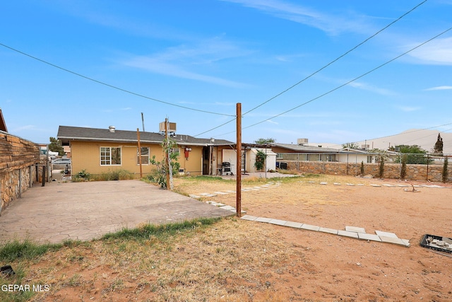 5713 Sanders Ave, El Paso, TX 79924 - rear view of property featuring a patio area and a fenced backyard