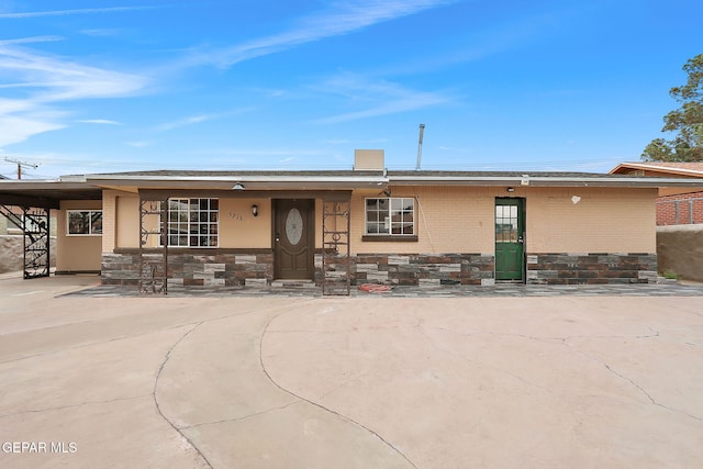 5713 Sanders Ave, El Paso, TX 79924 - view of front of home featuring brick siding and stone siding