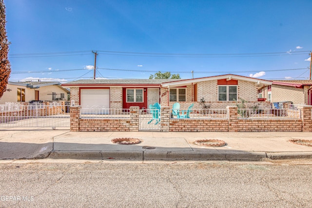 5137 Edmonton Ave, El Paso, TX 79924 - view of front of property with a fenced front yard and brick siding