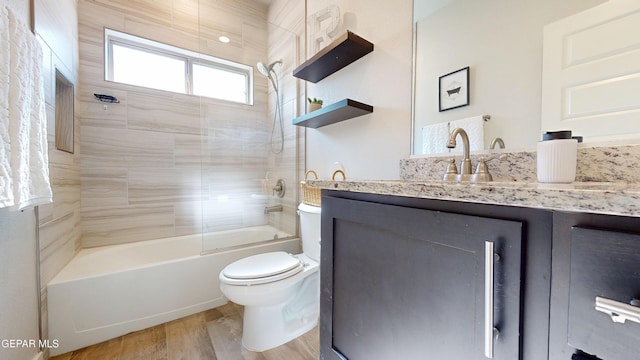 569 Logwood Ave, Canutillo, TX 79835 - bathroom with vanity, toilet, bathing tub / shower combination, and wood finished floors