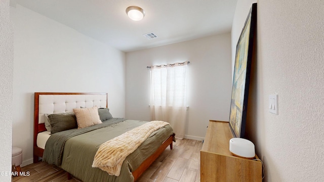 569 Logwood Ave, Canutillo, TX 79835 - bedroom featuring light wood-style flooring