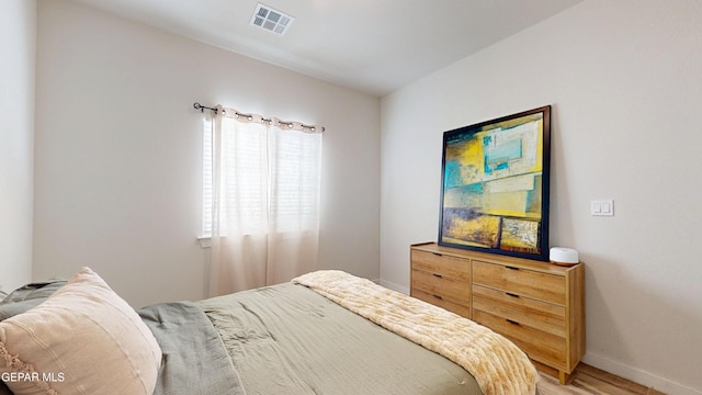 569 Logwood Ave, Canutillo, TX 79835 - bedroom with baseboards and light wood-type flooring