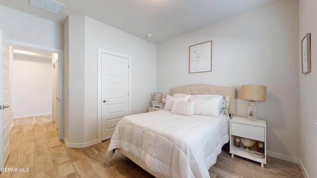 569 Logwood Ave, Canutillo, TX 79835 - bedroom with light wood-style flooring and baseboards