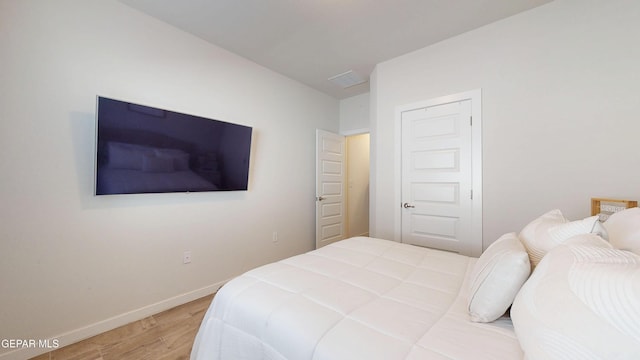 569 Logwood Ave, Canutillo, TX 79835 - bedroom with wood finished floors and baseboards