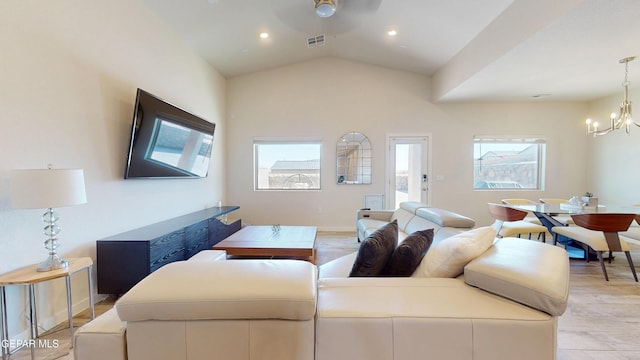 569 Logwood Ave, Canutillo, TX 79835 - living room with a chandelier, lofted ceiling, baseboards, and recessed lighting