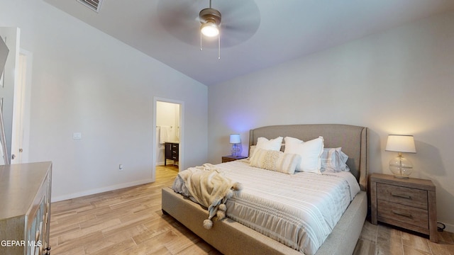 569 Logwood Ave, Canutillo, TX 79835 - bedroom with vaulted ceiling, light wood finished floors, baseboards, a ceiling fan, and connected bathroom