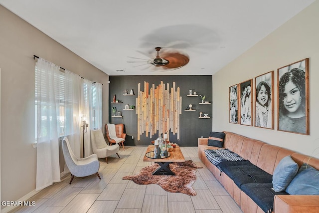 14809 Tierra Escape Ave, El Paso, TX 79938 - living area featuring a ceiling fan and an accent wall
