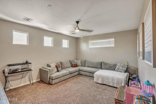 14809 Tierra Escape Ave, El Paso, TX 79938 - carpeted living area with ceiling fan and baseboards