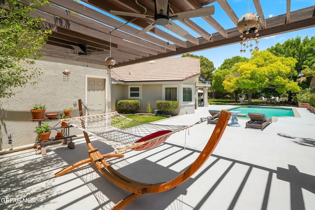 12081 E Paseo De Amor Ln E, El Paso, TX 79936 - view of patio with ceiling fan and an outdoor pool