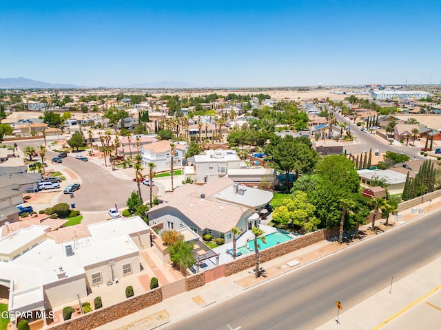 12081 E Paseo De Amor Ln E, El Paso, TX 79936 - aerial perspective of suburban area featuring a pool and mountains