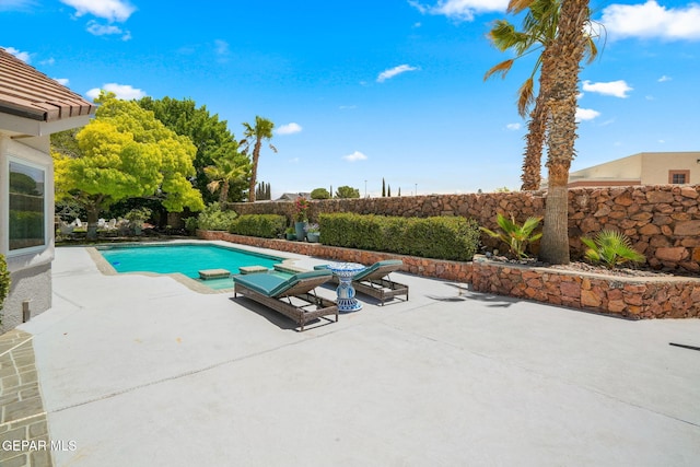 12081 E Paseo De Amor Ln E, El Paso, TX 79936 - view of swimming pool with a patio area