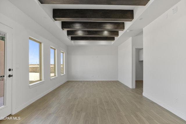 10700 Elise St, El Paso, TX 79924 - empty room featuring light wood finished floors and baseboards
